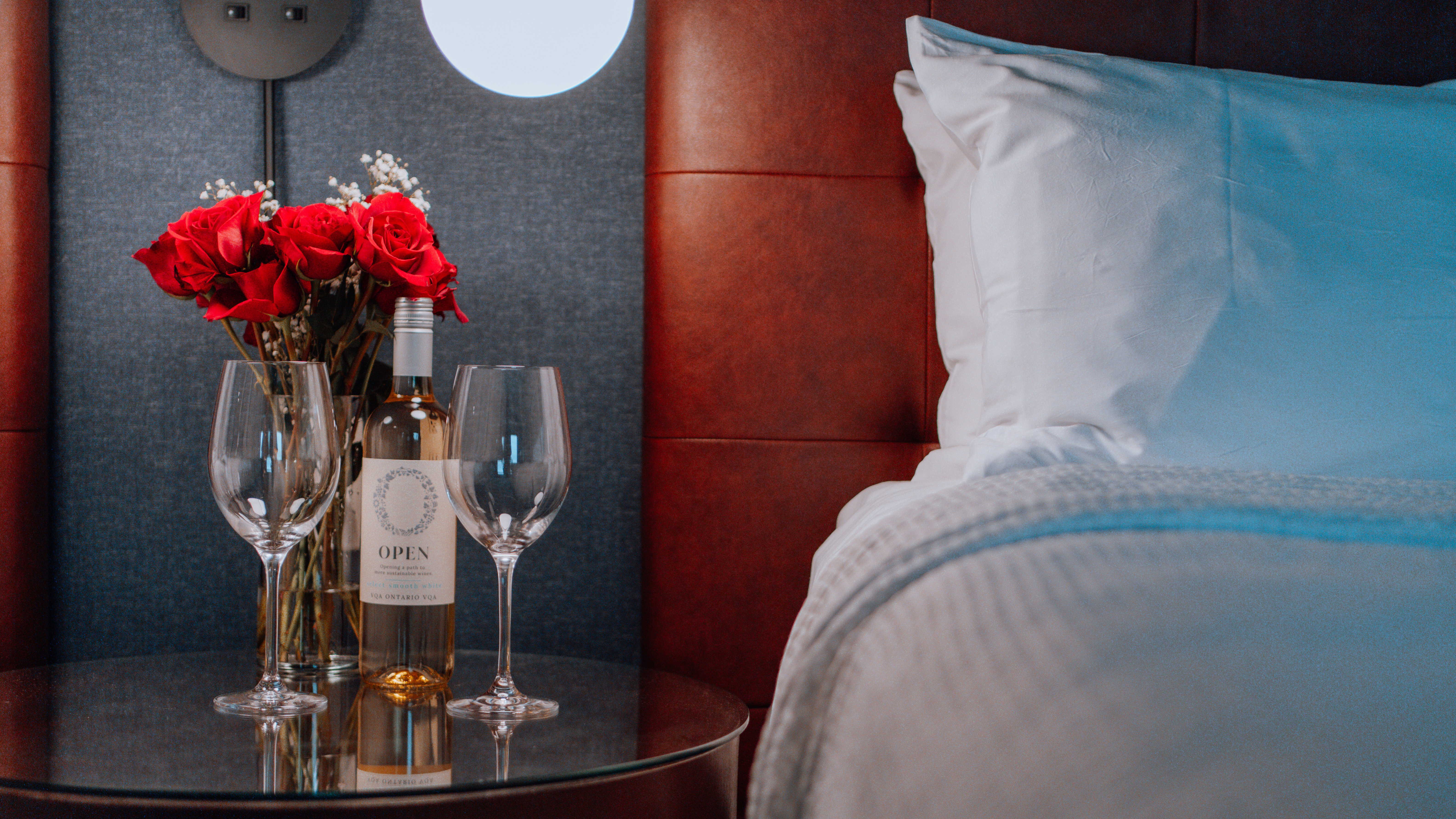 Dining table with fancy glasses and mood lighting.